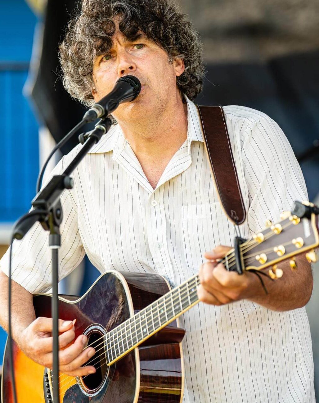 Photo of Gord Phillips playing guitar.